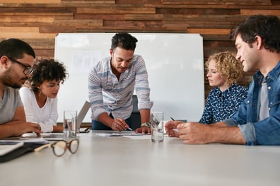 Table of people brainstorming