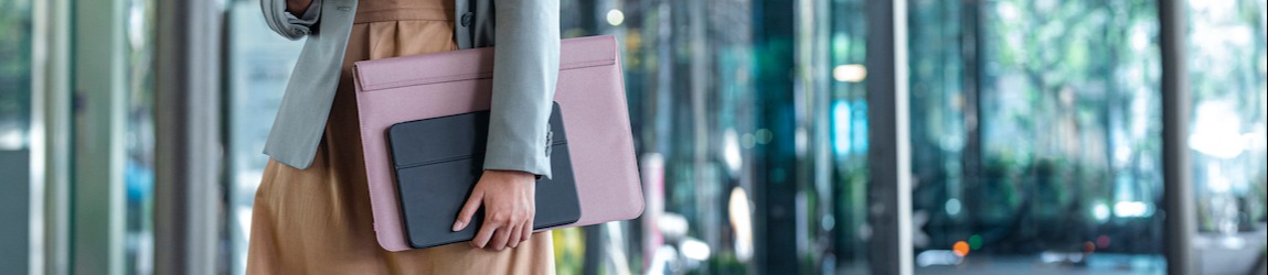businesswoman carrying laptop tote