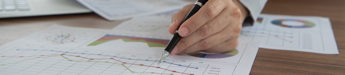 Account manager analyzing charts