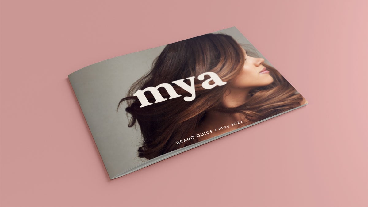 mya booklet with stylized hair on cover.